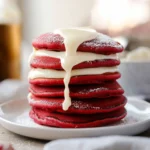 Red Velvet Pancakes with Cream Cheese Icing First Image First Image